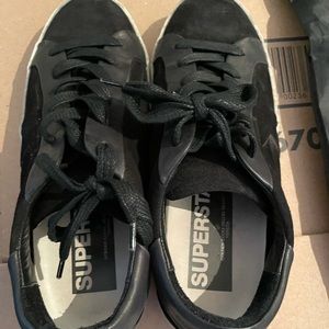Golden Goose black sneakers